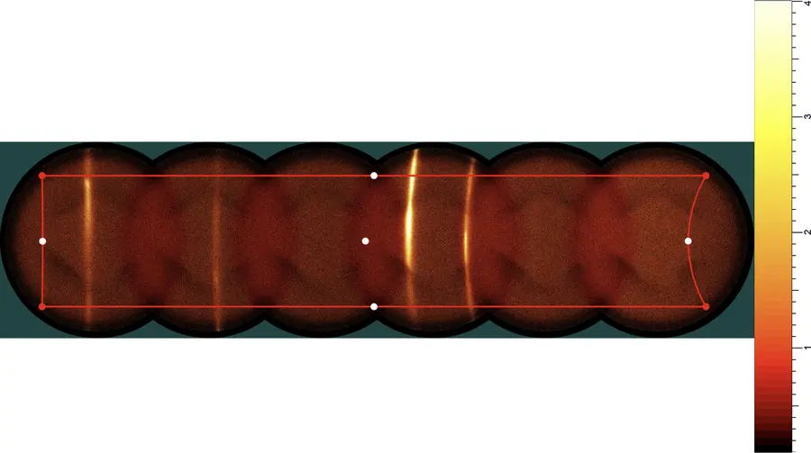 High-speed powder diffraction. Six detector frames stitched into one strip; the boxed region is what gets integrated into a pattern.