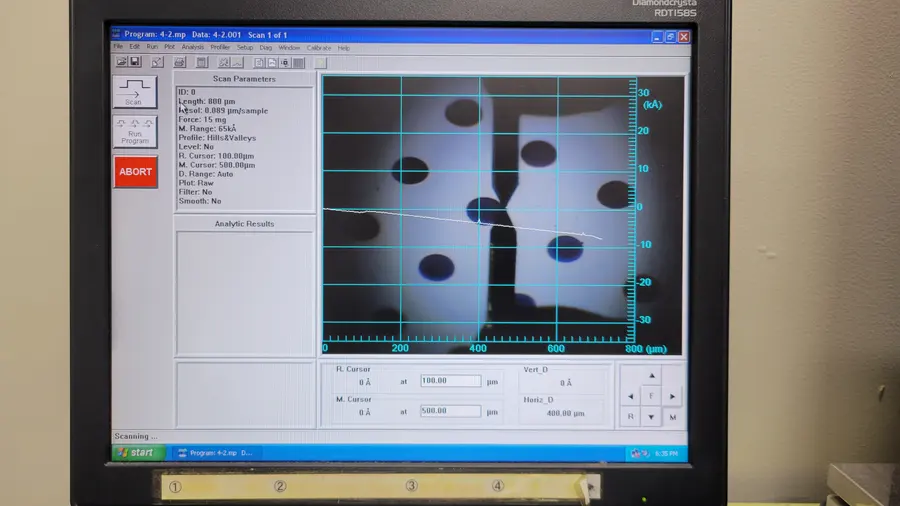 Calibrating deposition rate. Stylus profilometry across a masked step turns laser pulses into ångströms.