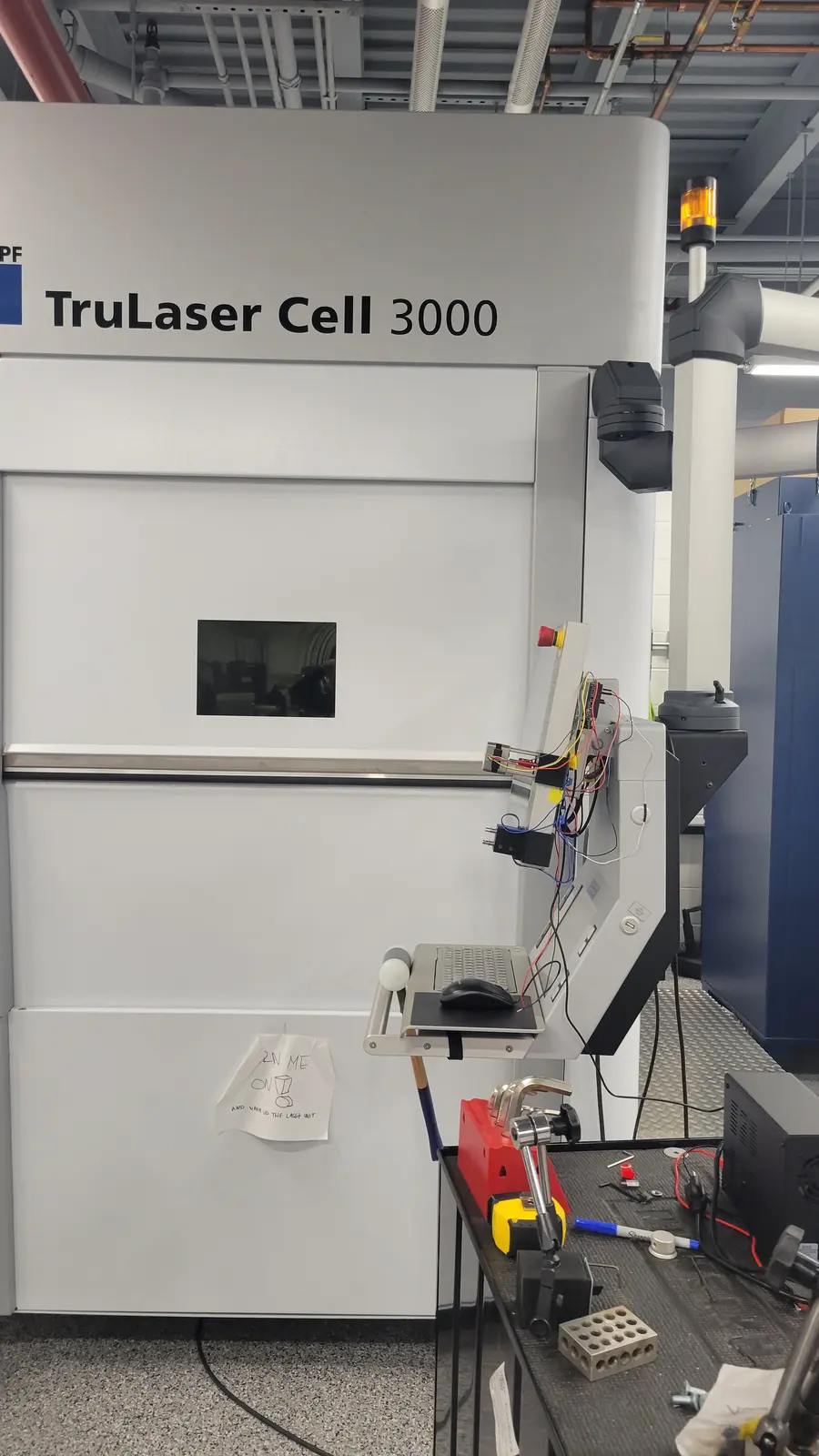 Getting control of a commercial machine. A TruLaser Cell 3000 that never shipped with an API, wired for programmatic control.