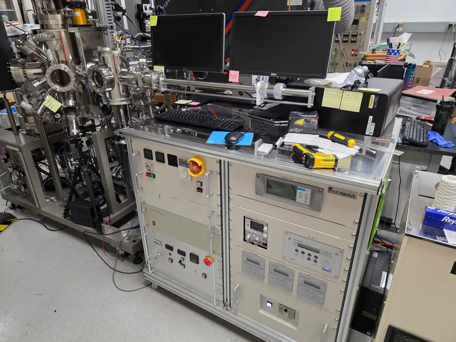PLD system, other side. Vacuum, gas handling, and laser optics all have to agree before anything grows.