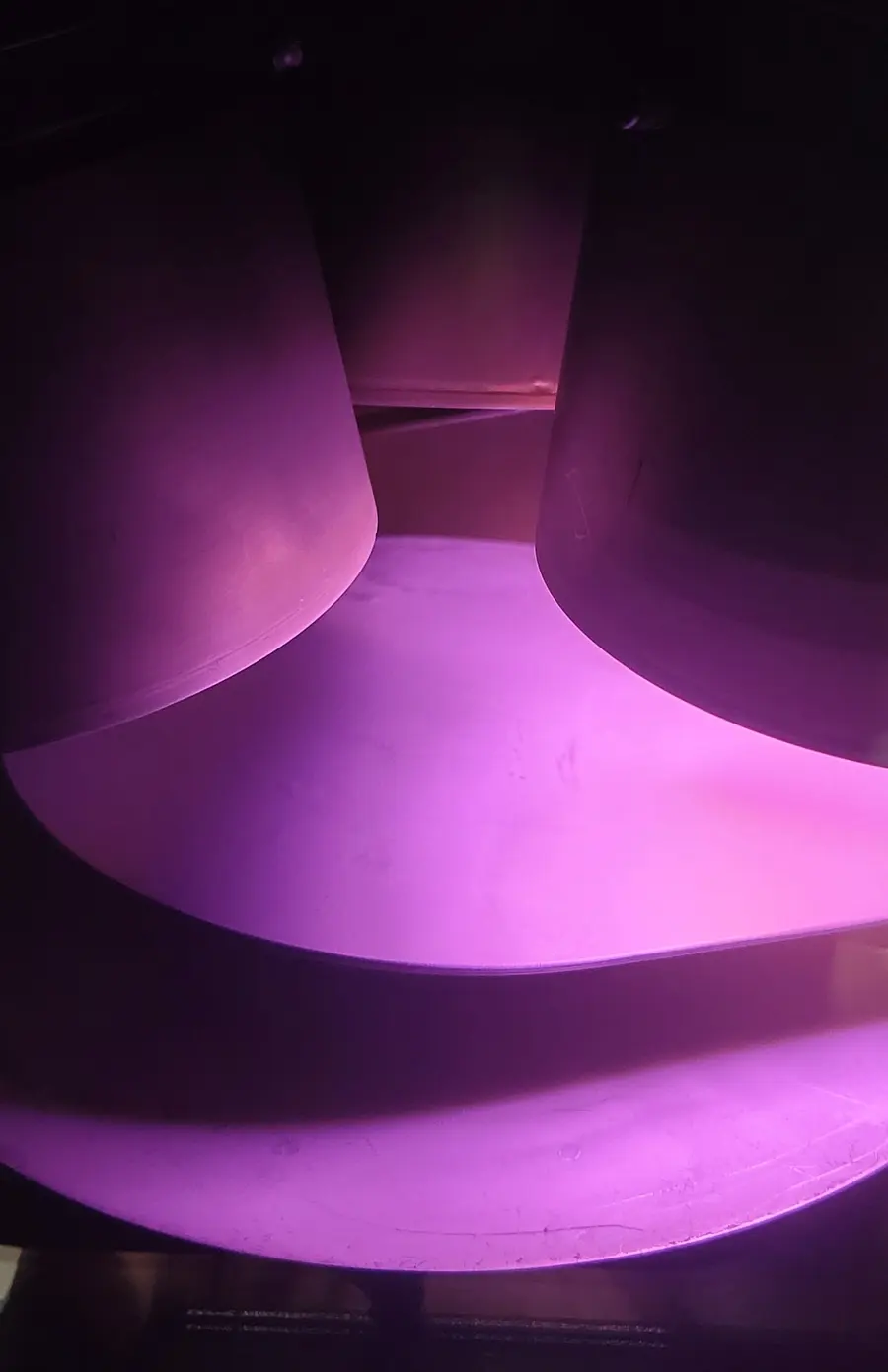 Sputtering plasma. Argon glow discharge, mid-deposition.